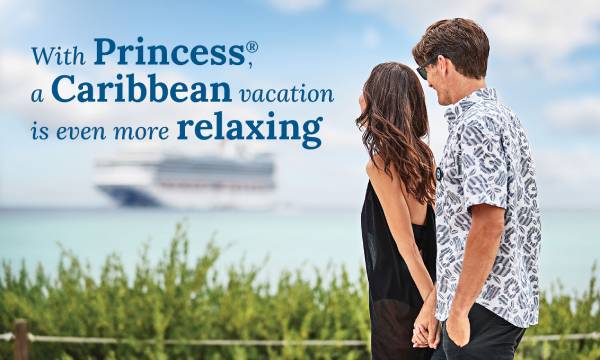 Image of couple on shore holding hands looking at cruise ship