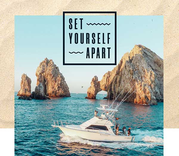 Set Yourself Apart - A charter fishing boat on the ocean. Become a Los Cabos Specialist.