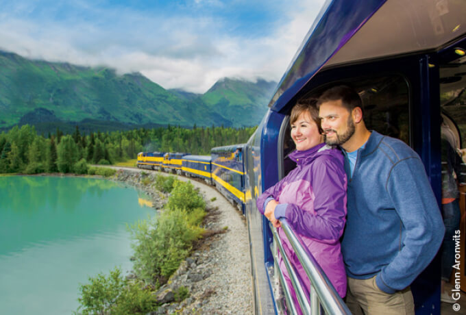 Photo of man and women on train